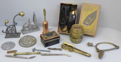 Small metalwares including money boxes, a pair of Shakespeare nutcrackers, fishing lures, etc.