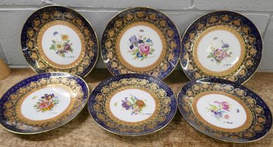 A set of six hand painted and gilt decorated plates, signed L Monet
