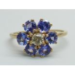 A 9ct gold, tanzanite and diamond cluster ring, 2.6g, U