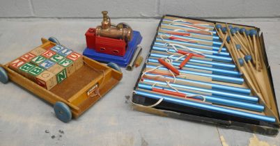 A Japanese Linemar Toys model steam engine, a Tri-ang wooden block pulley toy and a Boys Brigade