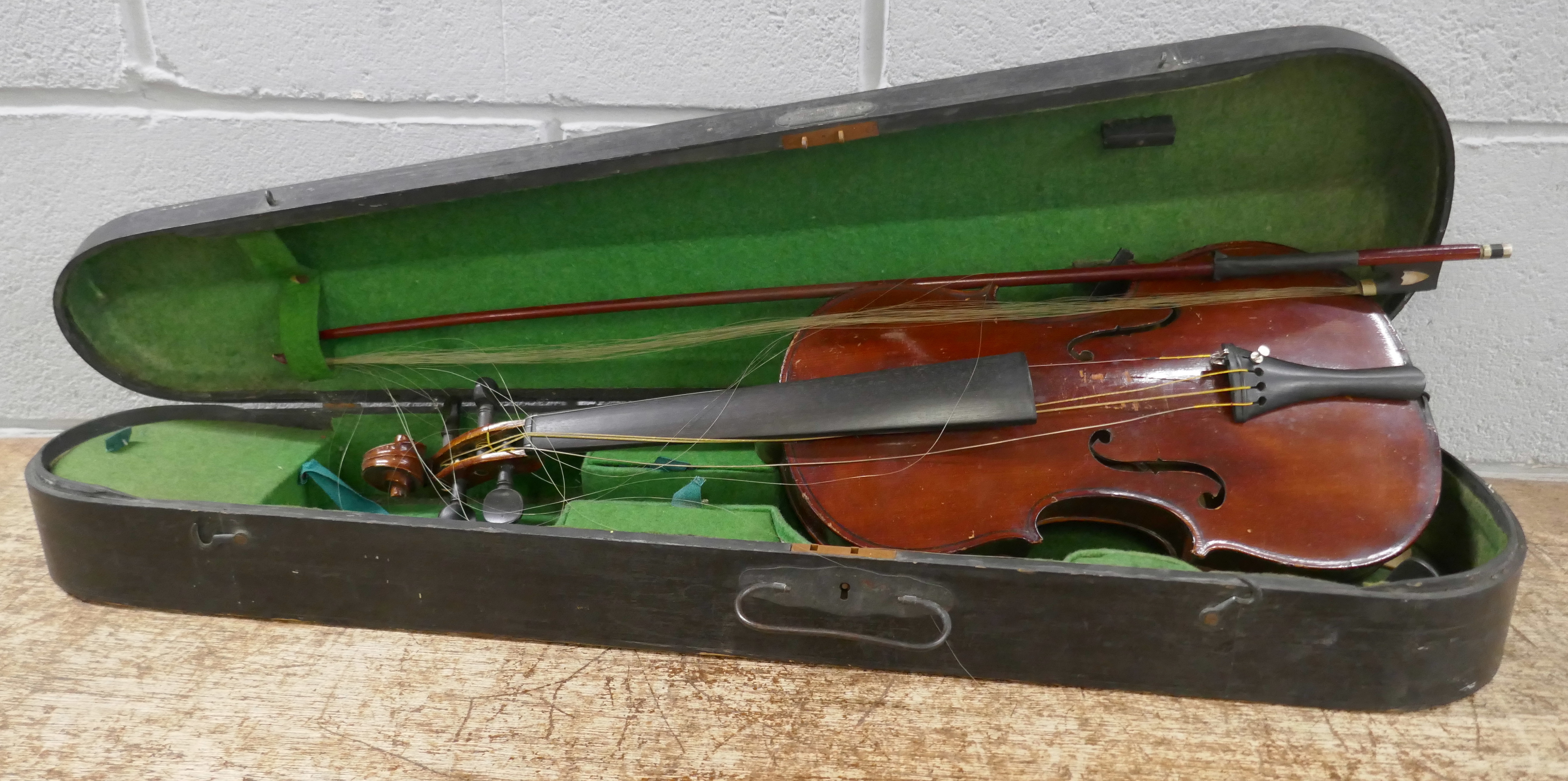 A Murdoch, Murdoch & Co violin and bow, cased, length of back excluding button 36cm, some