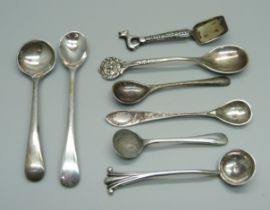 A Norwegian Arts and Crafts spoon by Henrik Moller, five other silver condiment spoons and two