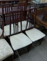 A set of four Morris Furniture mahogany dining chairs