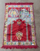 An eastern red silk prayer mat
