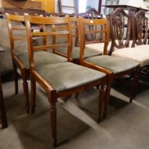 A set of four Hepplewhite style mahogany dining chairs and another set of four dining chairs