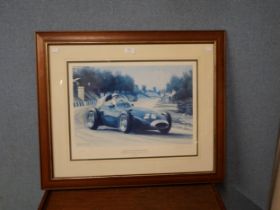 A Stuart Booth print, Sterling Moss, framed, C.O.A verso