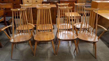 A set of eight Ercol Blonde elm and beech Goldsmith chairs