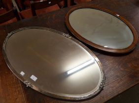 A chrome framed mirror and an inlaid framed mirror