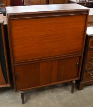 A Beaver & Tapley tola wood writing cabinet