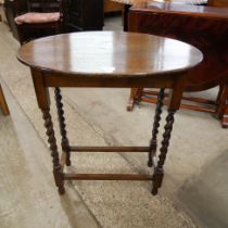 An early 20th Century oak barleytwist occasional table