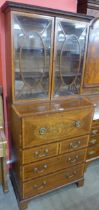 A Regency inlaid mahogany secretaire bookcase