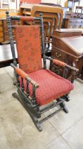 A 19th Century American beech rocking chair