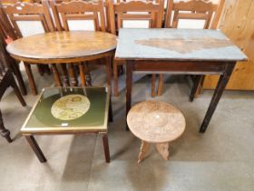 A Victorian inlaid walnut oval loo table, an eastern carved hardwood occasional table and two others