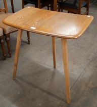 An Ercol Blonde elm and beech Windsor side table