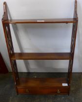 A Chippendale style mahogany wall hanging bookcase