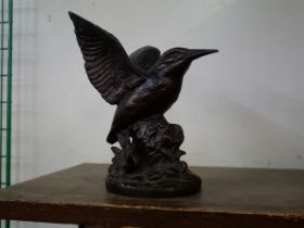 A bronze figure of a kingfisher