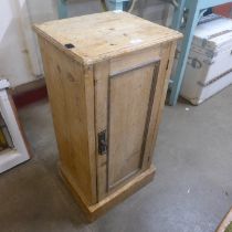 A pine pot cupboard