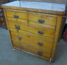 A Victorian walnut chest of drawers