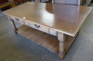An 18th Century style Ipswich oak two drawer coffee table