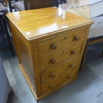 A Victorian satin birch four drawer pedestal chest