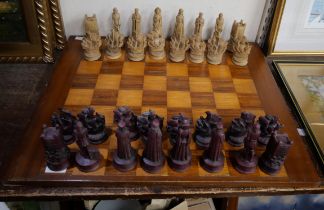 A chessboard and resin pieces