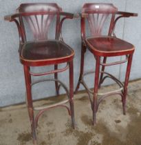 A pair of beech bentwood bar stools