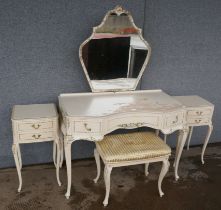 A French style cream and parcel gilt dressing table, stool and pair of bedsides