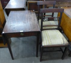 A George III mahogany Pembroke table and a pair of chairs