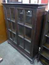 A late 19th century Dutch oak two door bookcase