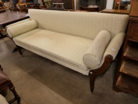 A Victorian oak and fabric upholstered scroll arm settee