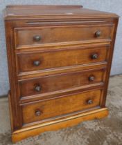 An oak chest of drawers