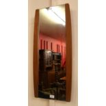 A teak framed mirror