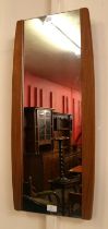 A teak framed mirror