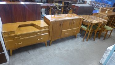 A G-Plan Brandon oak dressing table, cupboard and oak table and four dining chairs