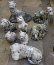 Assorted concrete cats and dog garden ornaments