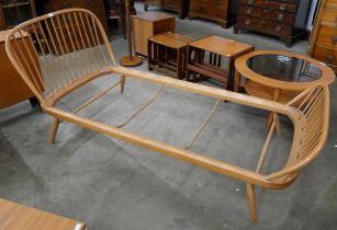 An Ercol Blonde beech single bed frame