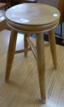 A pine kitchen stool