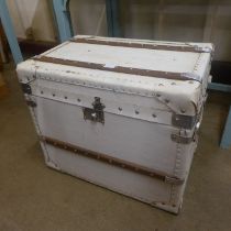 An early 20th Century style white leather steamer trunk