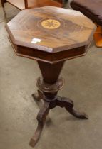 A Victorian inlaid walnut trumpet shaped lady's sewing table