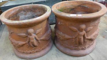 A pair of large garden terracotta planters