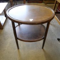 A Fischel beech bentwood two tier occasional table and a pair of chairs