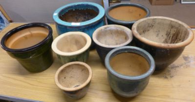 Eight glazed plant pots