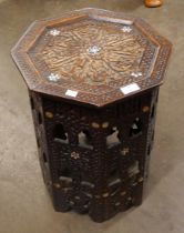 A Moorish mother of pearl inlaid hardwood octagonal occasional table