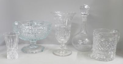 A cut glass decanter and faceted ball stopper, cut glass water jug, a cut glass celery/flower