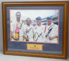 A framed and mounted picture, signed by four England players; Martin Bicknell, Mark Butcher,