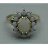 A 9ct gold and opal cluster ring, 2.2g, M