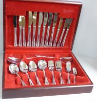 An Oneida canteen of cutlery in a wooden case