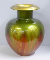 A modern glass vase in green, red and gold, 32cm