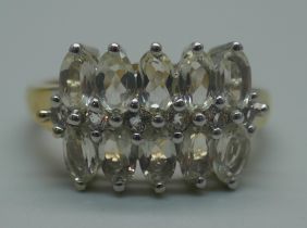 A silver gilt, serenite and topaz ring, S