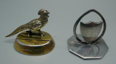 Two silver menu card holders, shield, Birmingham 1910, and rooster, Chester 1912